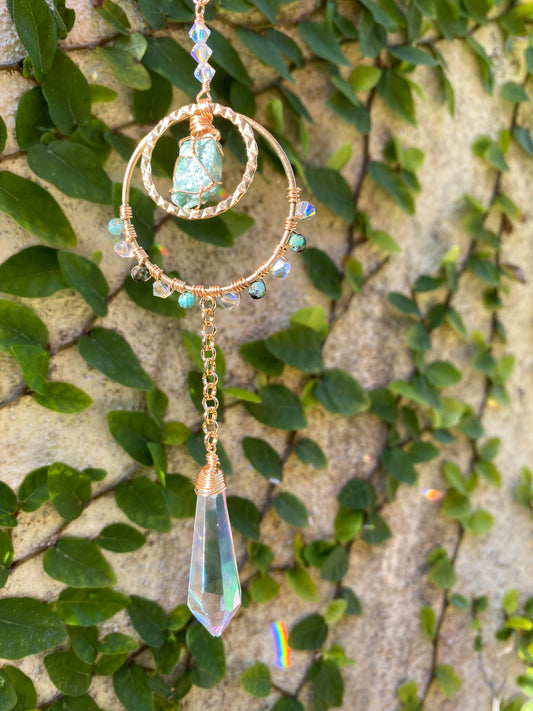 Rough Fuchsite sun catcher with large crystal point